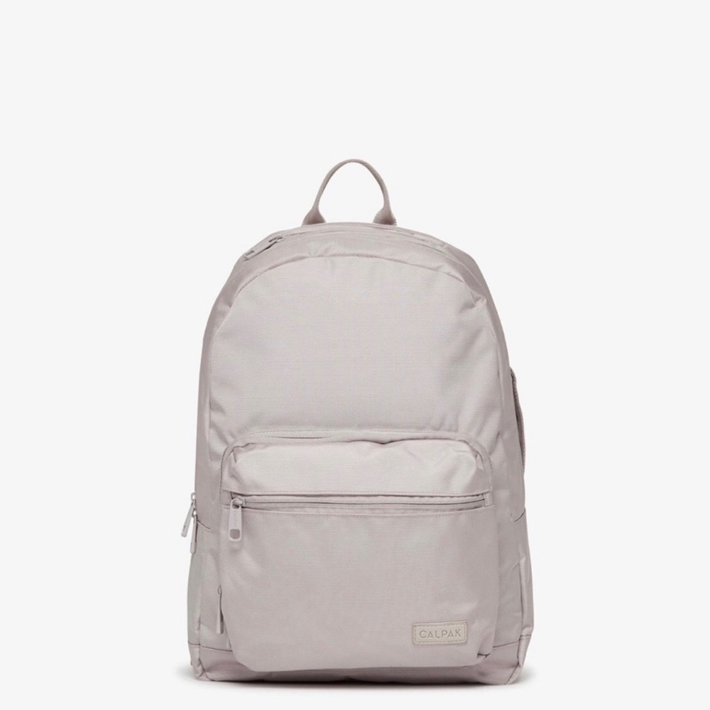 Calpak cream backpack